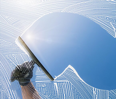 Cleaning Window on a bright sunny day