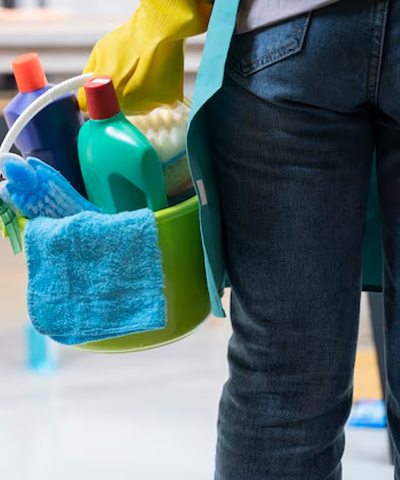 Plastic bucket with cleaning products